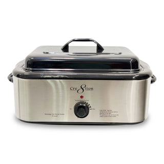 Stainless steel Cre8tion 18Q hot stone heater with a black handled lid and front temperature knob