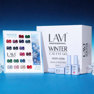 Lavi Winter cat eye kit box and swatch card of cool blue, green and silver shades on a deep blue set