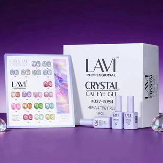 Lavi Crystal cat eye kit box and swatch card of shimmer pastels on a purple set